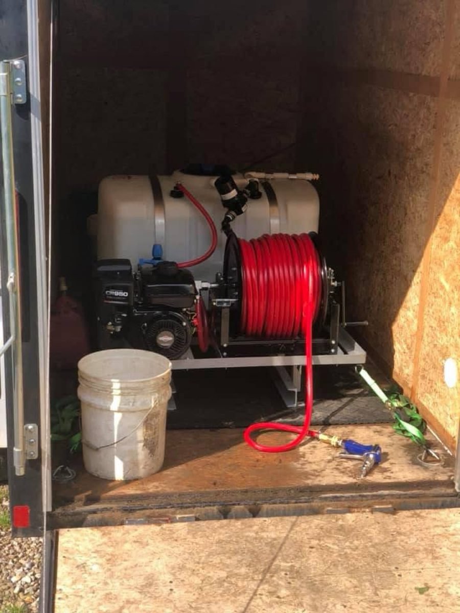 Commercial spray unit with tank and hose reel, ready for a job